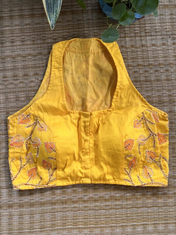 Yellow Designer Sleeveless Blouse
